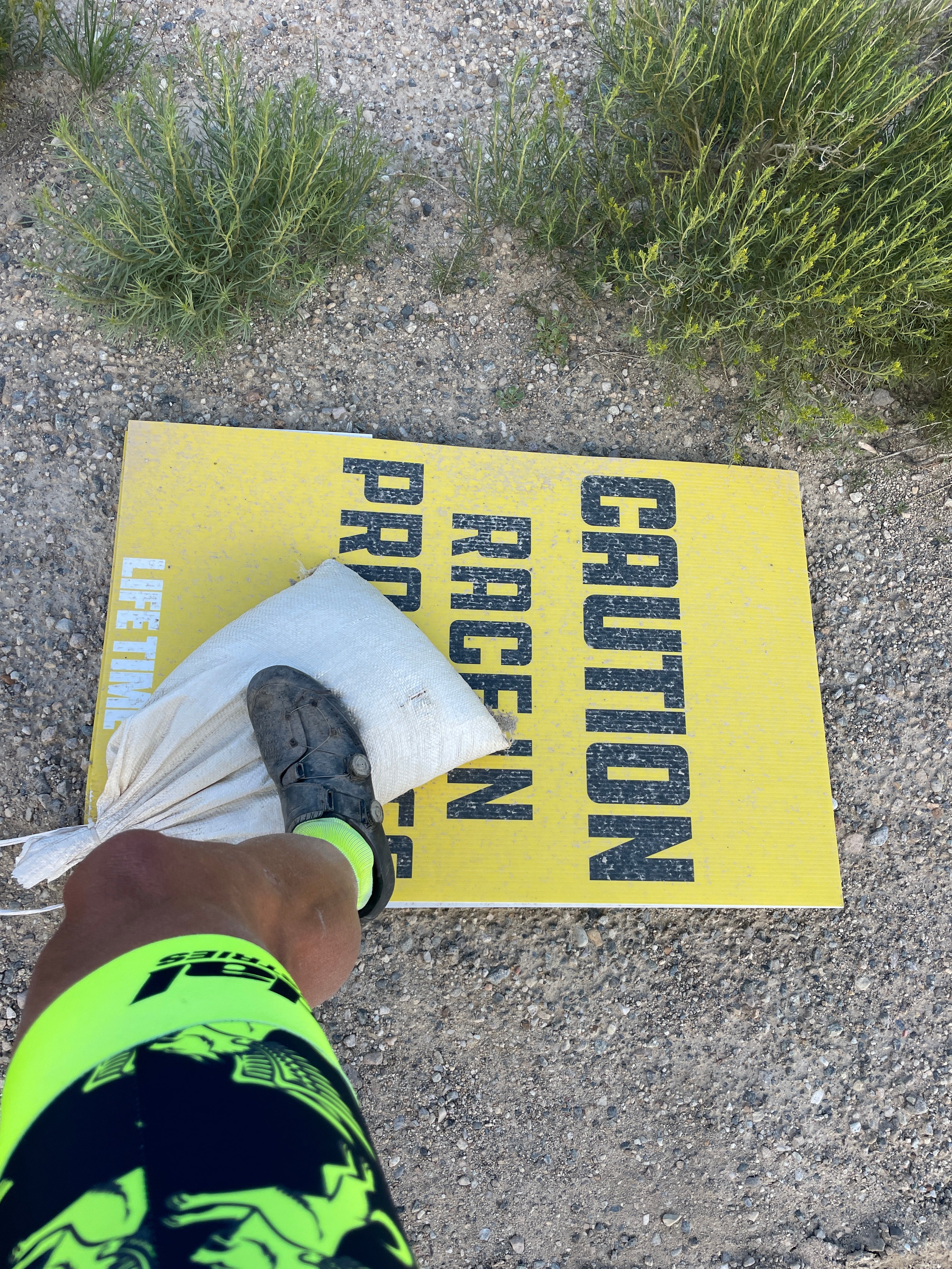 CAUTION: RACE IN PROGRESS